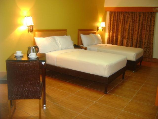 Pamulinawen Hotel Laoag Pokoj fotografie